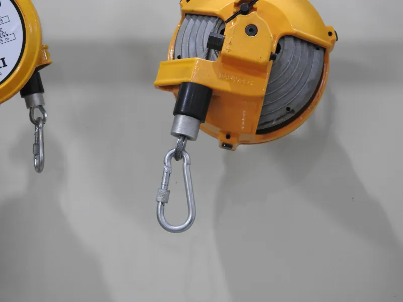 Materiaal en functie van bufferrubberhuls voor veerbalancer?
